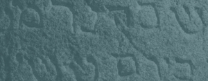 Hebrew text engraved in rock